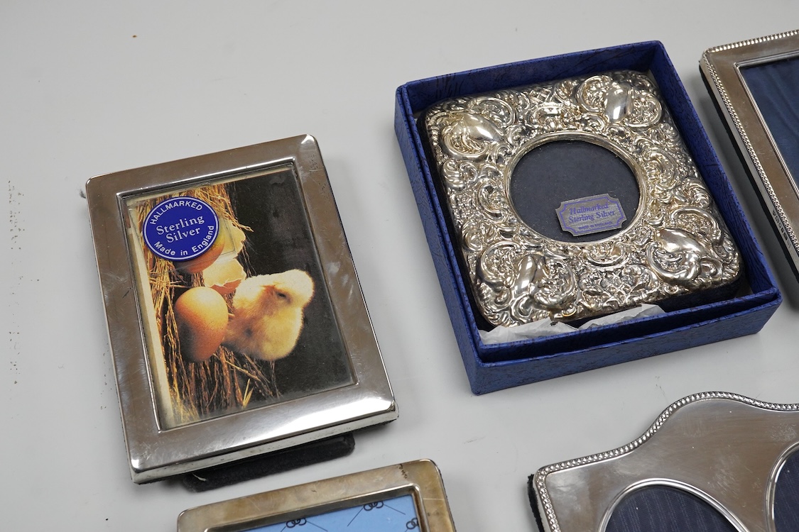 A collection of eight modern silver mounted photograph frames, including double, maker AN, width 11.2cm.